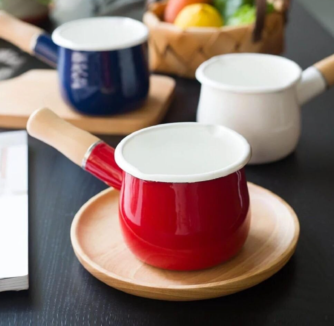 Mini enamel milk pot with wooden handle and dual pouring spouts, ideal for heating drinks and melting butter or chocolate (Red)